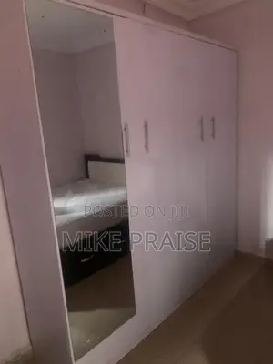 A Quality 7ft by 7ft Wardrobe With Mirror