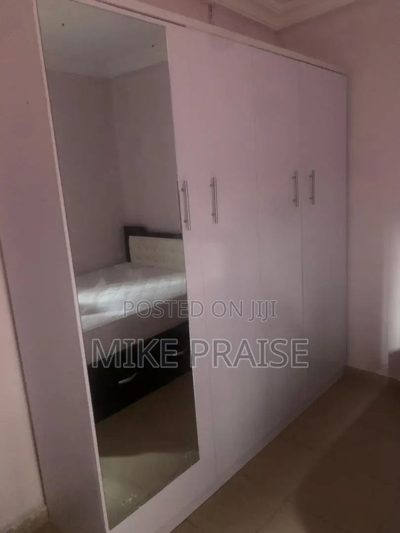 A Quality 7ft by 7ft Wardrobe With Mirror