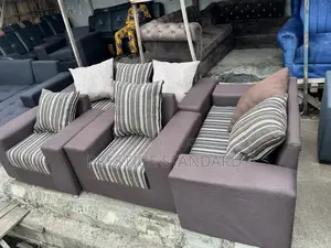 A Standard 7 Seater Brown Sofa