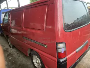 Mitsubishi L300 2001 Red