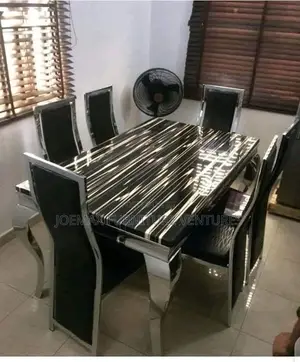 Marble Dining Table By6 With Six Leather Chairs.