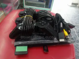 Ps2 Slim With 15 Games Inside and 2 Pad