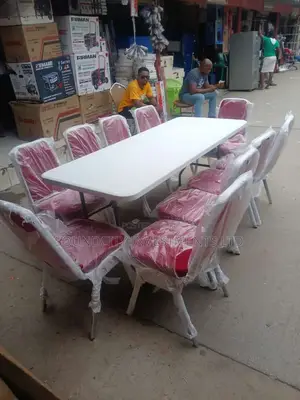 Garden/Lounge Table With Stainless Leg Banquet Chair.