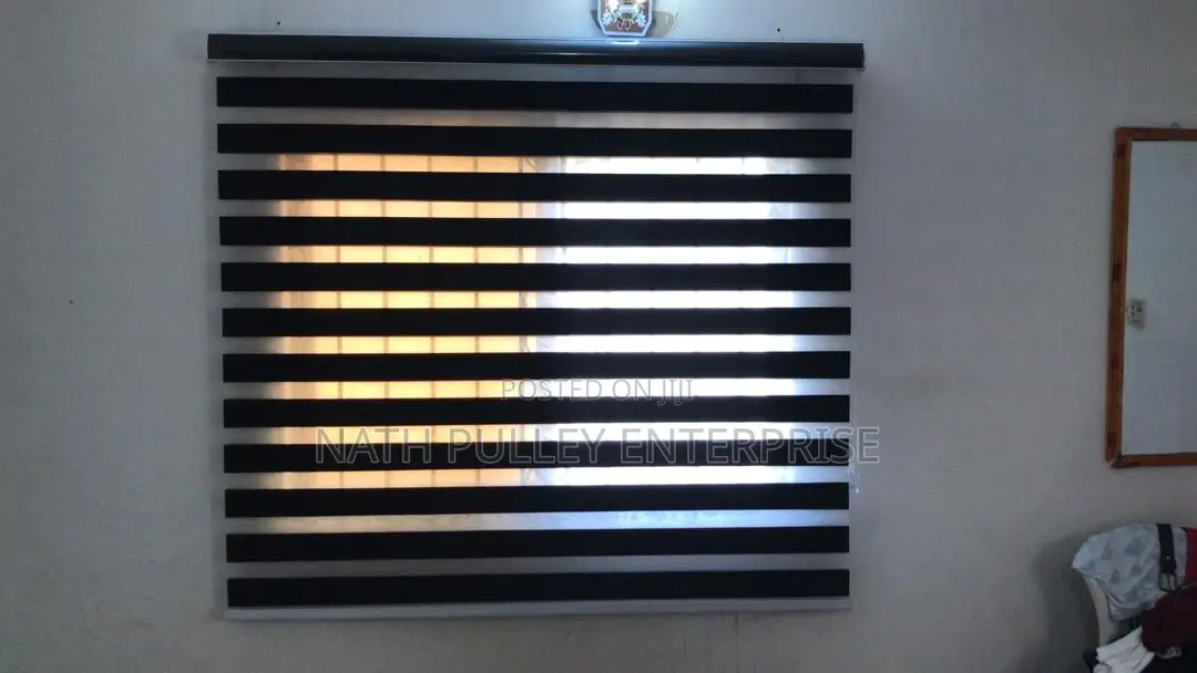Newly Installed Plain Black Blinds