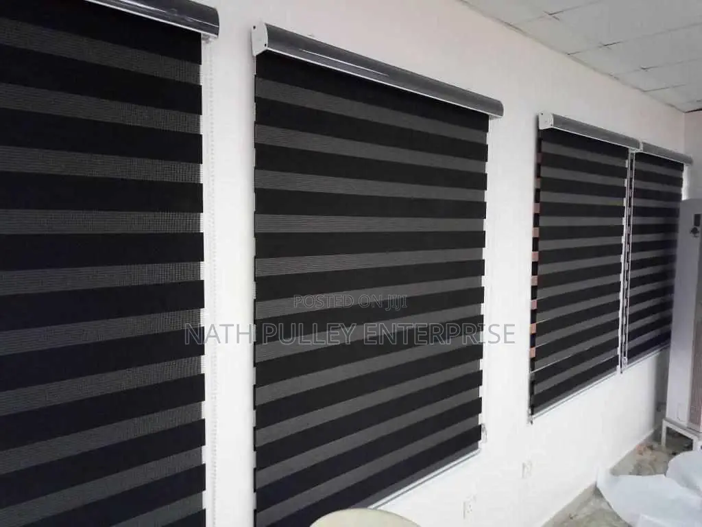 Newly Installed Plain Black Blinds