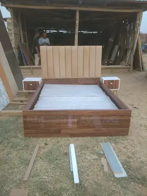 Quality Bed Frame With Chest Paddings and Two Gold Drawers