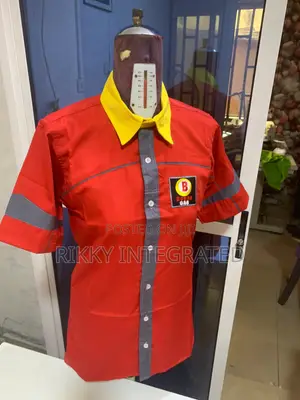 Expert Designers Creating Unique Shirt Uniforms
