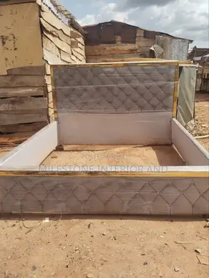 Gold -Defined Bedframe With Thufted Body Design