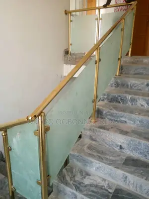 Gold Railing With White Glass