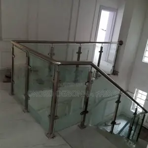 Housed Gold Railing and Design Glass