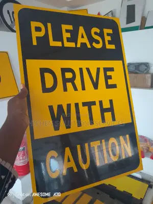 Please Drive With Caution Road Traffic Sign