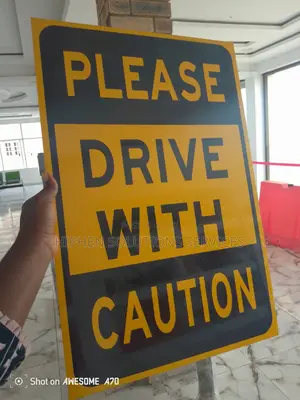 Caution Drive With Care Sign
