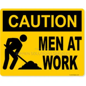 Roadway Construction Caution! Men At Work Sign