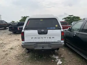 Nissan Frontier XE 4x2 King Cab 116.1 in. WB 2003 White