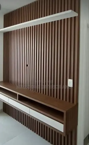 Wall-Clauded Tv Panel With Multi Coloured Suspended Console