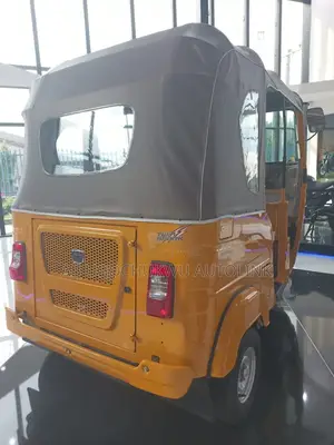 New Bajaj RE 2024 Yellow