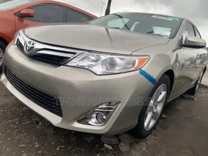 Toyota Camry LE 4dr Sedan (2.5L 4cyl 6A) 2013 Gold