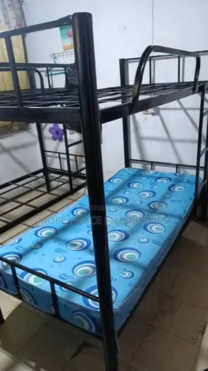 Detachable Metal Bunk Bed With Ladder Base 6*3 Feet.