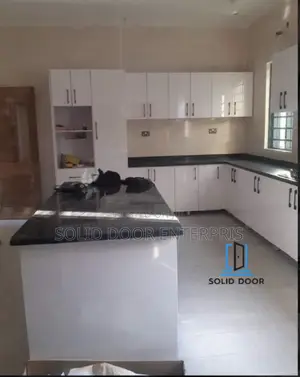 A Solid Kitchen Cabinet With Accessories