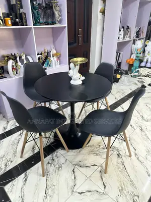 Black Peach Like Set of 4 Seater With a Table