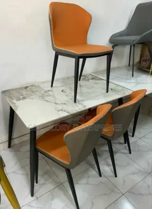 Dining Table 150,000, 6 Chairs at 55,000 Each