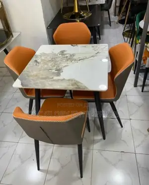 Dining Table 100,000 Chairs 55,000 Each