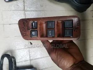 Nissan Glass Control Button