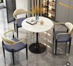 A Set of Marble Top Dining by 3
