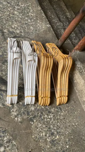 Sets of Ceramic White Hangers and Wooden Hangers