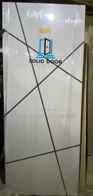 A Solid HDF Flush Door With Black Chrome