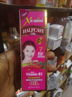 X White Half Cast Extreme Whitenin Oil ( for Glowing Skin)