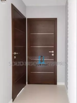 A Solid HDF Flush Door With Silver Chrome