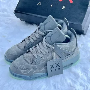 *Kaws X Air Jordan 4 Retro Sneakers