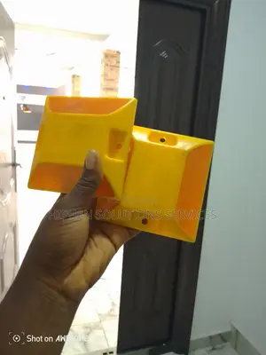Red And Yellow Plastic Stud Reflectors Warn Drivers