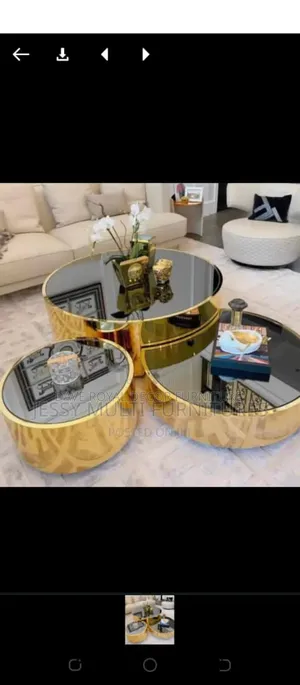 Round Gold Glass Top Center Table.
