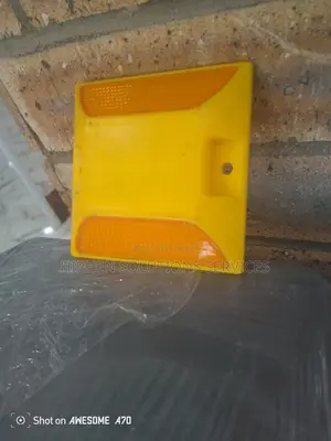 Red And Yellow Reflectors Warn Drivers