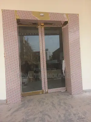 Sensor-Triggered Glass Panel Door