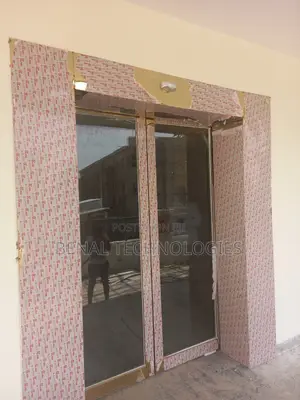 Automated Entryway With Glass Sliding Door