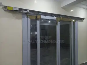 Seamless Glass Entryway With Motion Detection