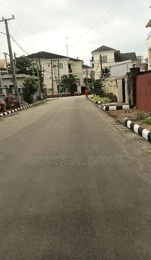 Half Plot of Dry Land Fenced Gated by Bakare Estate