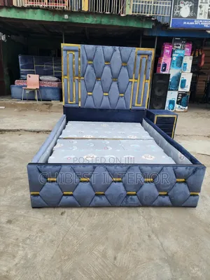 Grey 4.5by6 Padded Bed Frame With a Bed Side