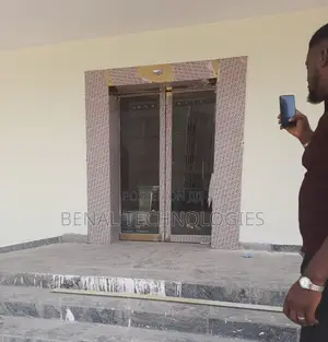 Sensor -Based Glass Doorway Systems for Buildings