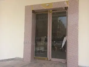 Modern Glass Entrance Powered by Smart Sensors