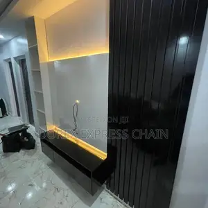 Glossy TV Console With Integrated LED Lighting