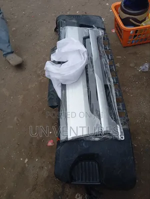 Bumper and Front Grill Toyota Hummer Bus 2014