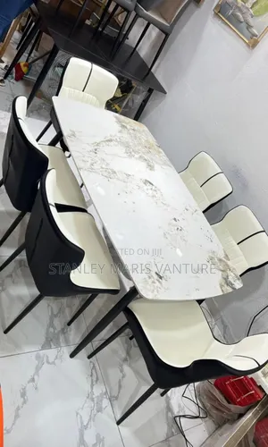 Luxurious Marble Dinning Set With Six Leather Chairs