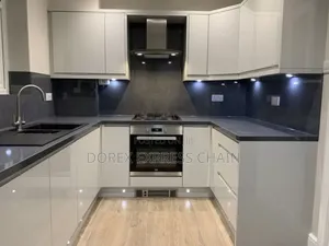 High- Gloss U-Shaped Kitchen Interior.