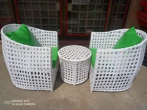 White Outdoor Rattan Chairs and Table With Cushions