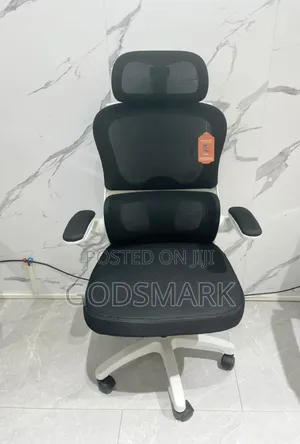 Unique Office Chair Swivel With White Back and Headrest.
