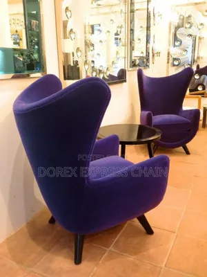 2 Wingback Chair And A Table, Just What Your Lobby Needs.